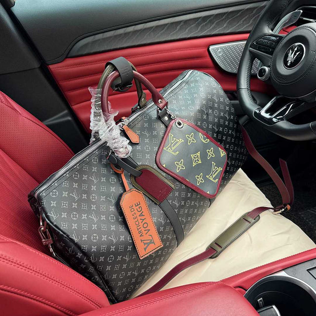 Louis Vuitton Keepall — Eclipse/Brown Tag